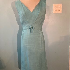 True vintage ( early 1960s) sleeveless wiggle dress in light blue